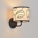 Luminaire mural VILNIUS cylindrique avec motif artistique visages à Dakar, Sénégal