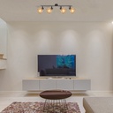 Plafonnier Wenna 4 lampes installées dans un salon moderne avec lumière diffuse à travers les abat-jour en bambou – Dakar, Sénégal.