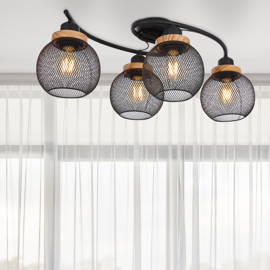 Plafonnier Pablo 4 lampes, installé dans une pièce moderne avec rideaux blancs, idéal pour une ambiance chaleureuse, Dakar, Sénégal.