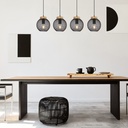 Lustre Pablo installé dans une salle à manger moderne, éclairage chaleureux, design épuré, Dakar, Sénégal