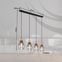 Lustre Fanni installé dans une salle à manger moderne - éclairage chaleureux et design épuré.