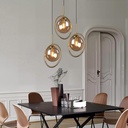 Lustre Industrielle 3 lampes en metal doré et boule en verre fumé