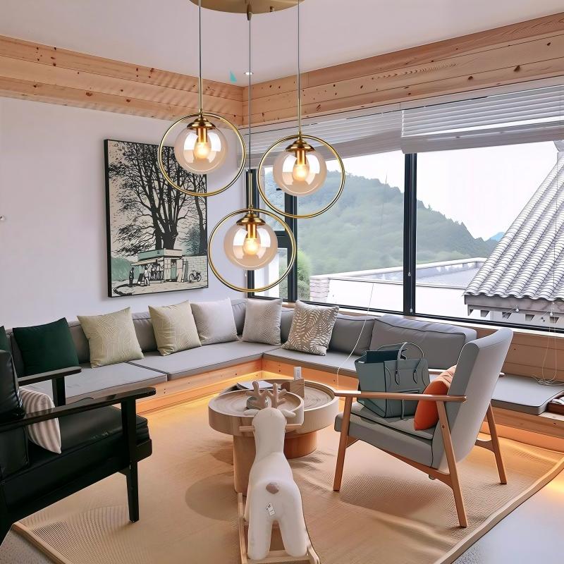 Lustre Industrielle 3 lampes en metal doré et boule en verre