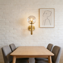 Applique murale Miira en metal doré et verre transparent