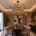 Salle à manger moderne au lustre étoilé.webp