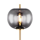 Détail du verre fumé du lampadaire Blacky, avec une ampoule visible, produit raffiné en métal laiton à Dakar, Sénégal
