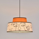 Suspension Majorque en coton motif visages et caramel avec lumière allumée - Dakar, Sénégal.