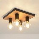 Plafonnier Conrad à 4 lampes, en bois naturel, offrant un éclairage chaleureux et élégant – Vue de près – Dakar, Sénégal.