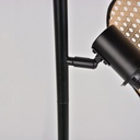 Détail du lampadaire Naytto, métal noir et cannage naturel, finition élégante, Dakar, Sénégal